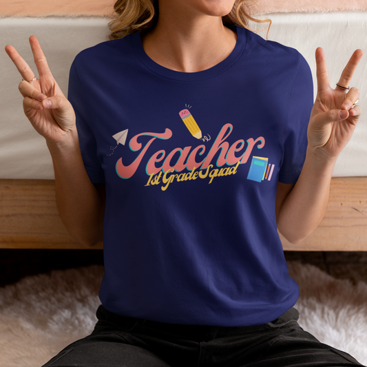 1st Grade Teacher Squad Pink Short Sleeve Tee